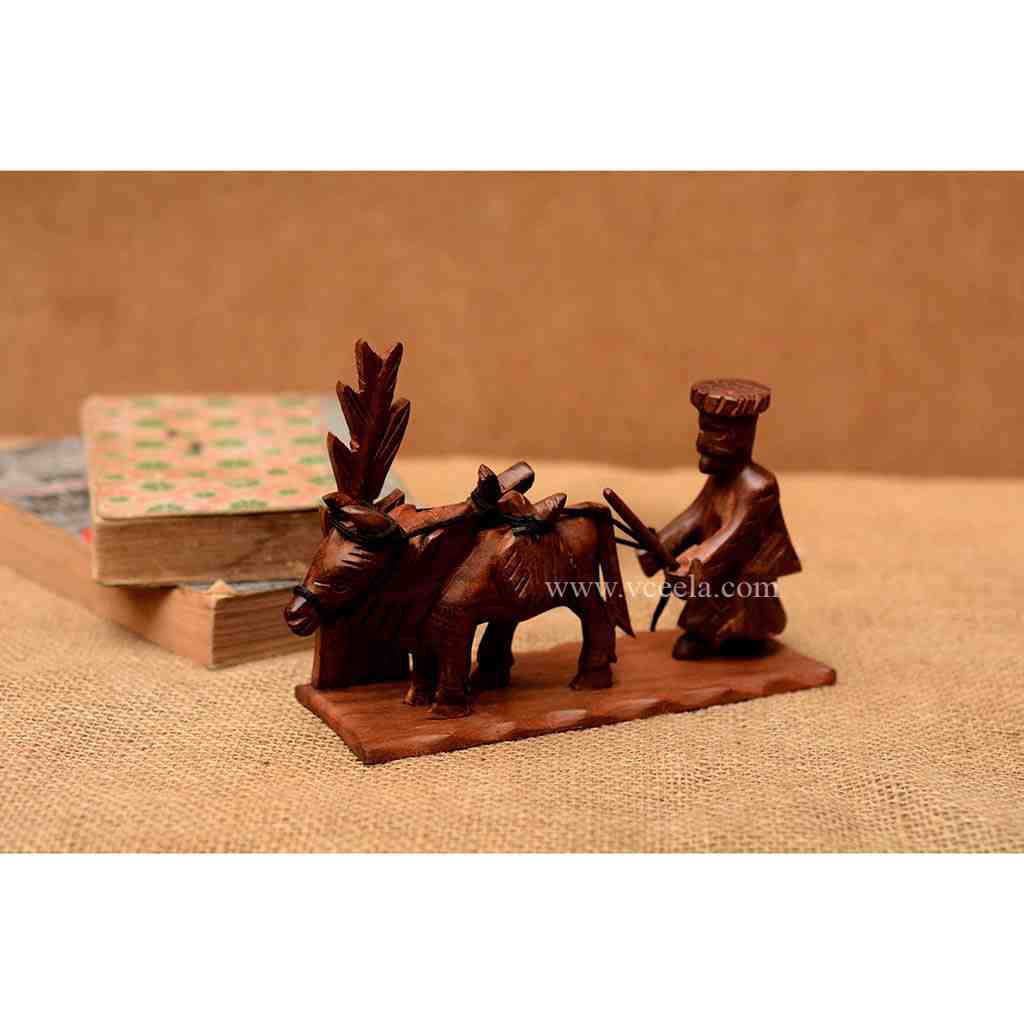 Cultural Wooden Bull in Fields