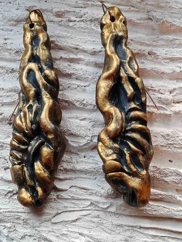 Hand sculpted earrings.